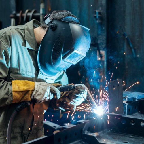 a-photo-of-a-man-welding-metal-pieces-together-tig-mig-welding